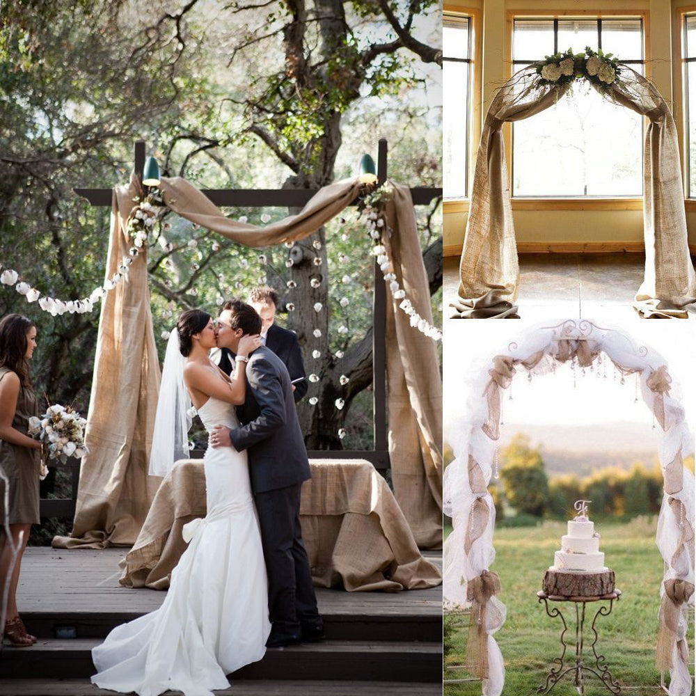 Wedding arches decorated with burlap and lace, with a bride and groom kissing outdoors.