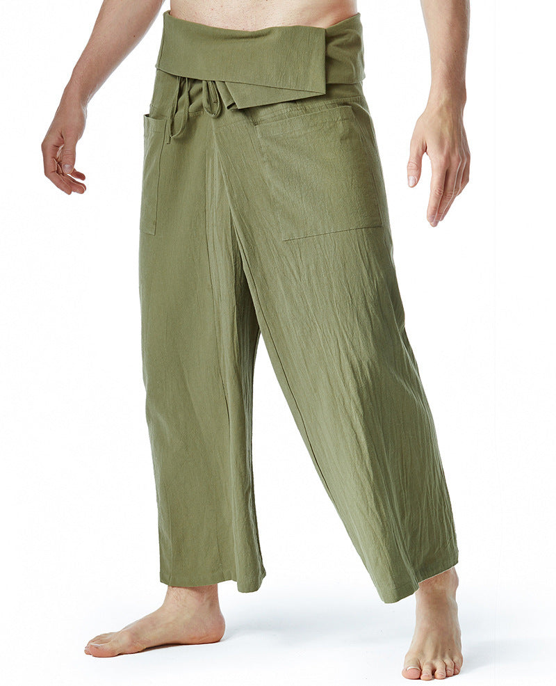Green wide-leg pants with a tie waist on a white background