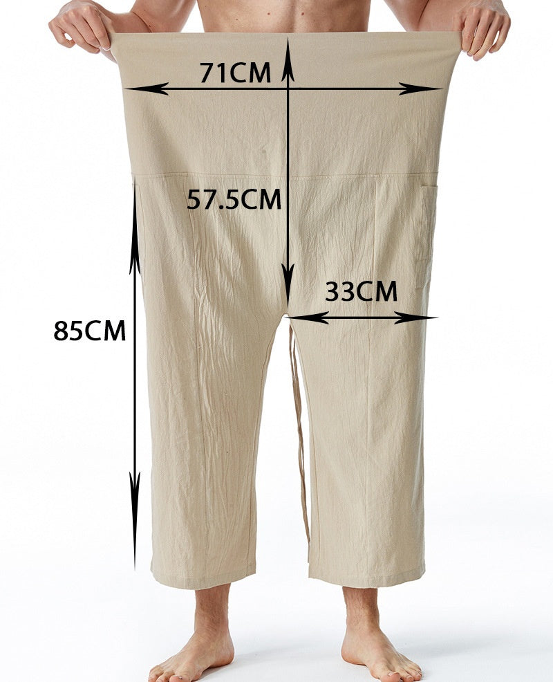 Beige pants with measurements marked on a white background