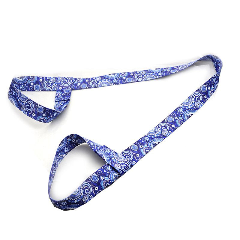 Blue and white patterned yoga strap on a white background