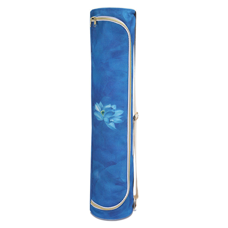 Blue floral-patterned yoga mat bag on a white background