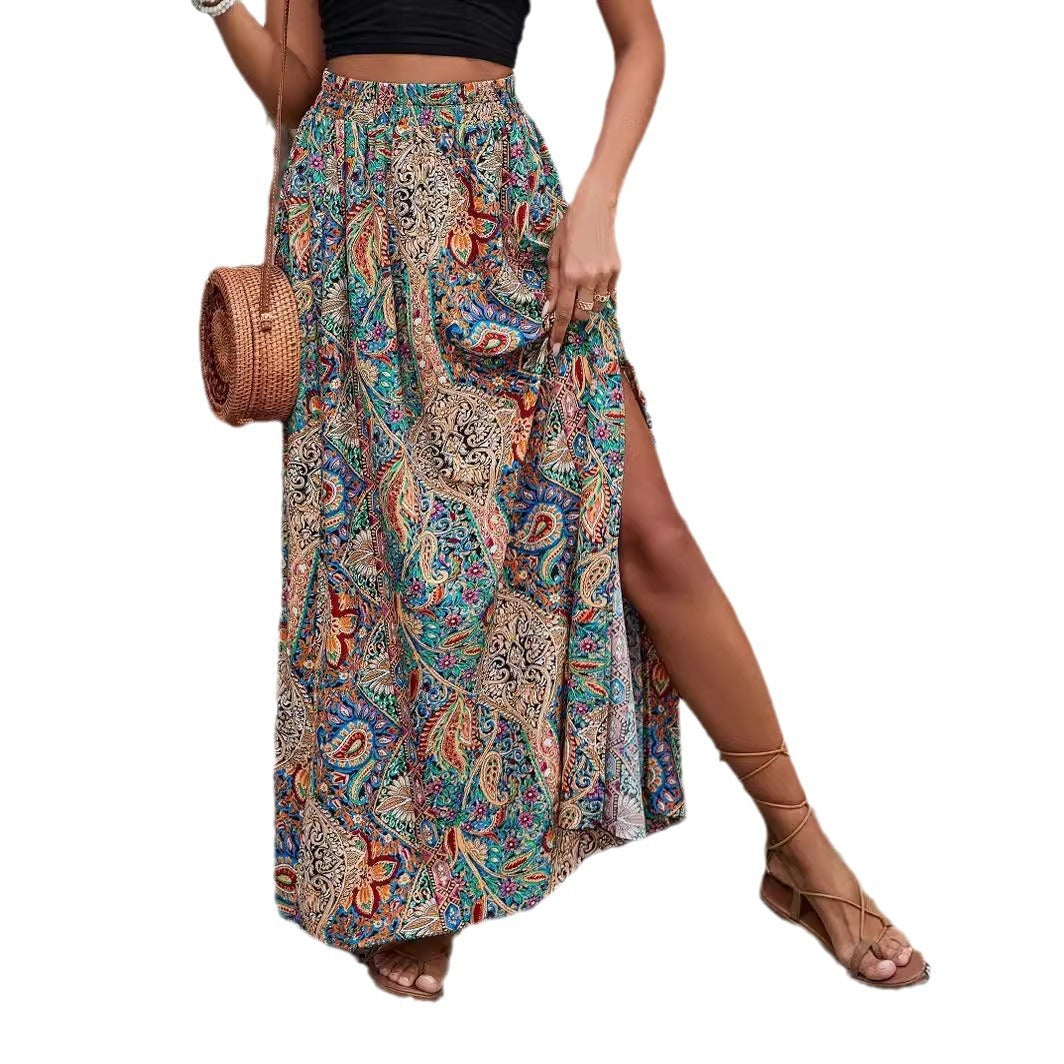 Woman wearing a colorful paisley patterned skirt on a white background