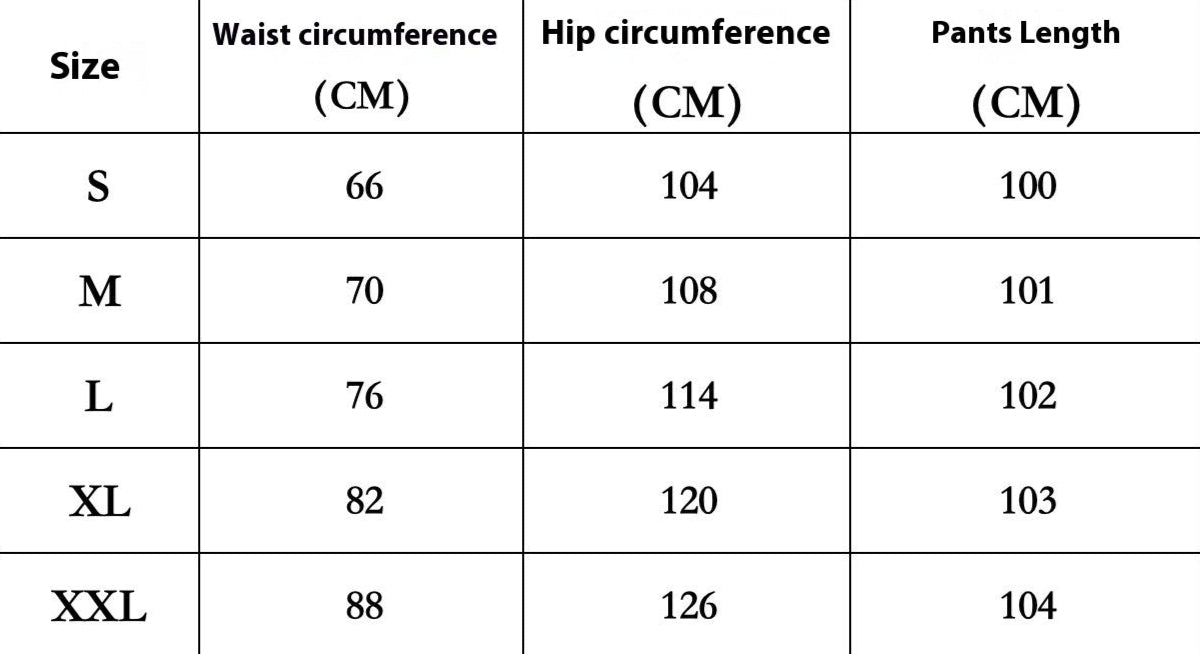 Table showing size chart for pants with measurements and a person wearing a green skirt.