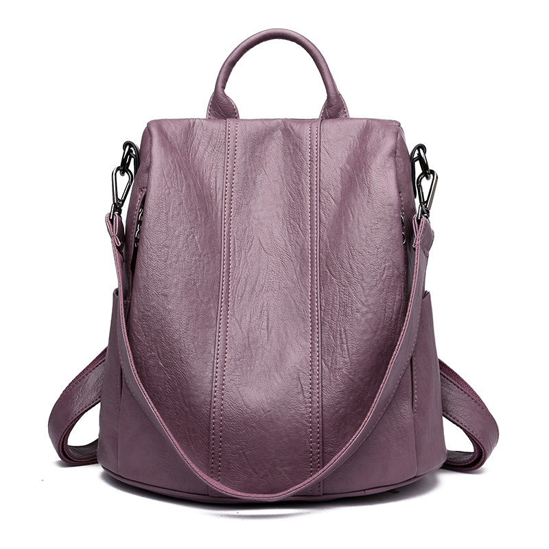 Purple backpack on a white background