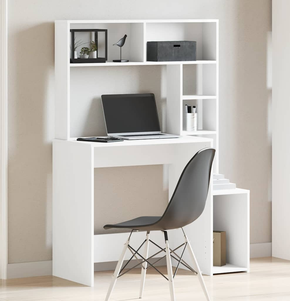 White desk with a chair and laptop in a minimalistic room.