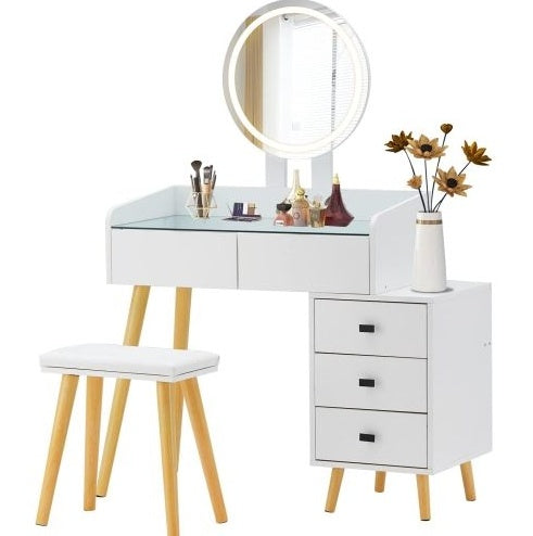White vanity table with mirror, drawers, and stool on a white background