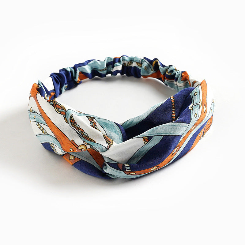 Colorful patterned headband on a white background