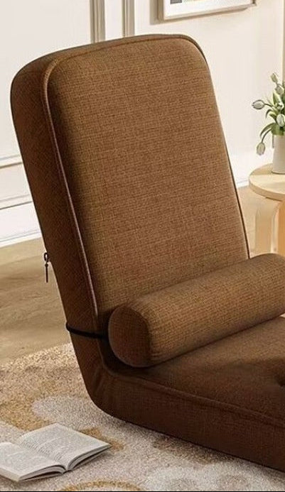 Brown adjustable chair with table in a living room setting