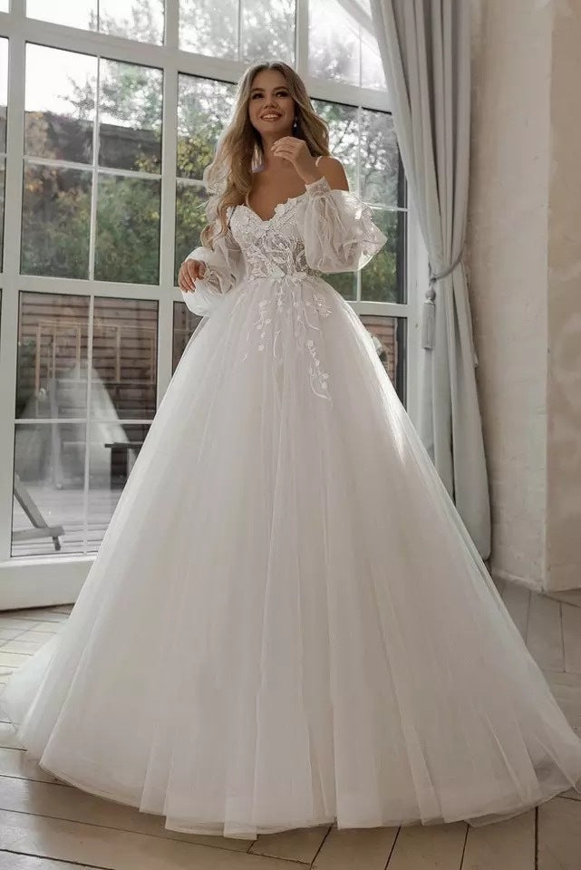 Boho Off Shoulder Long Sleeved Wedding Gown