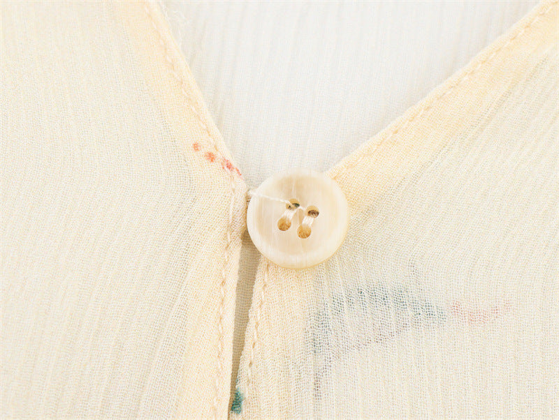 Close-up of a button on a textured fabric background