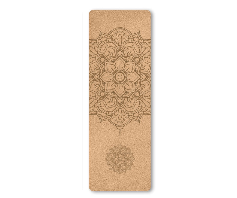 Cork yoga mat with mandala design on a white background