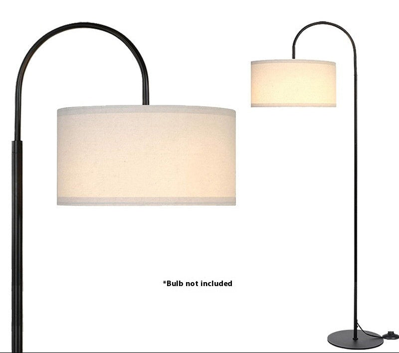 Elbow floor lamp with beige shade on a white background