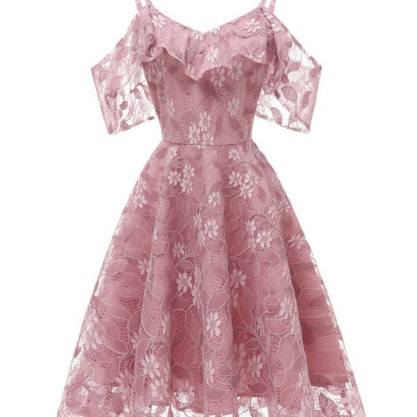 Pink lace dress on a white background
