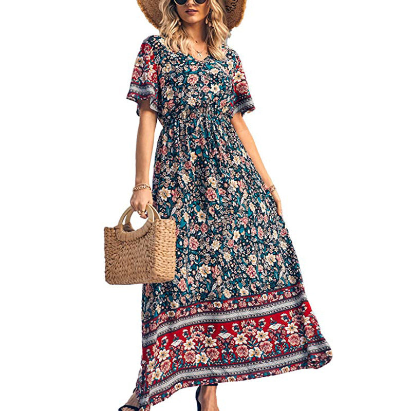 Woman wearing a floral dress holding a straw bag on a white background