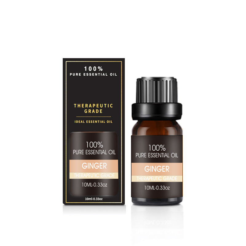 Ginger essential oil bottle and packaging on a white background