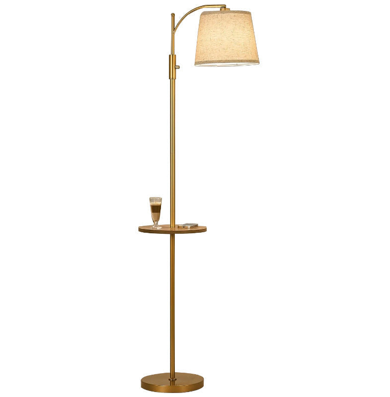 Floor lamp with a side table and glass on a white background