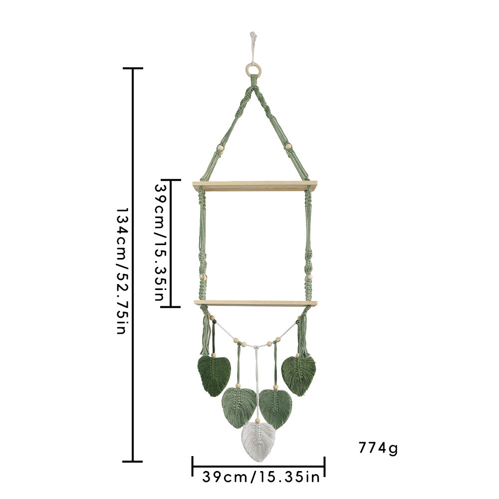 Hanging decorative item with measurements on a white background