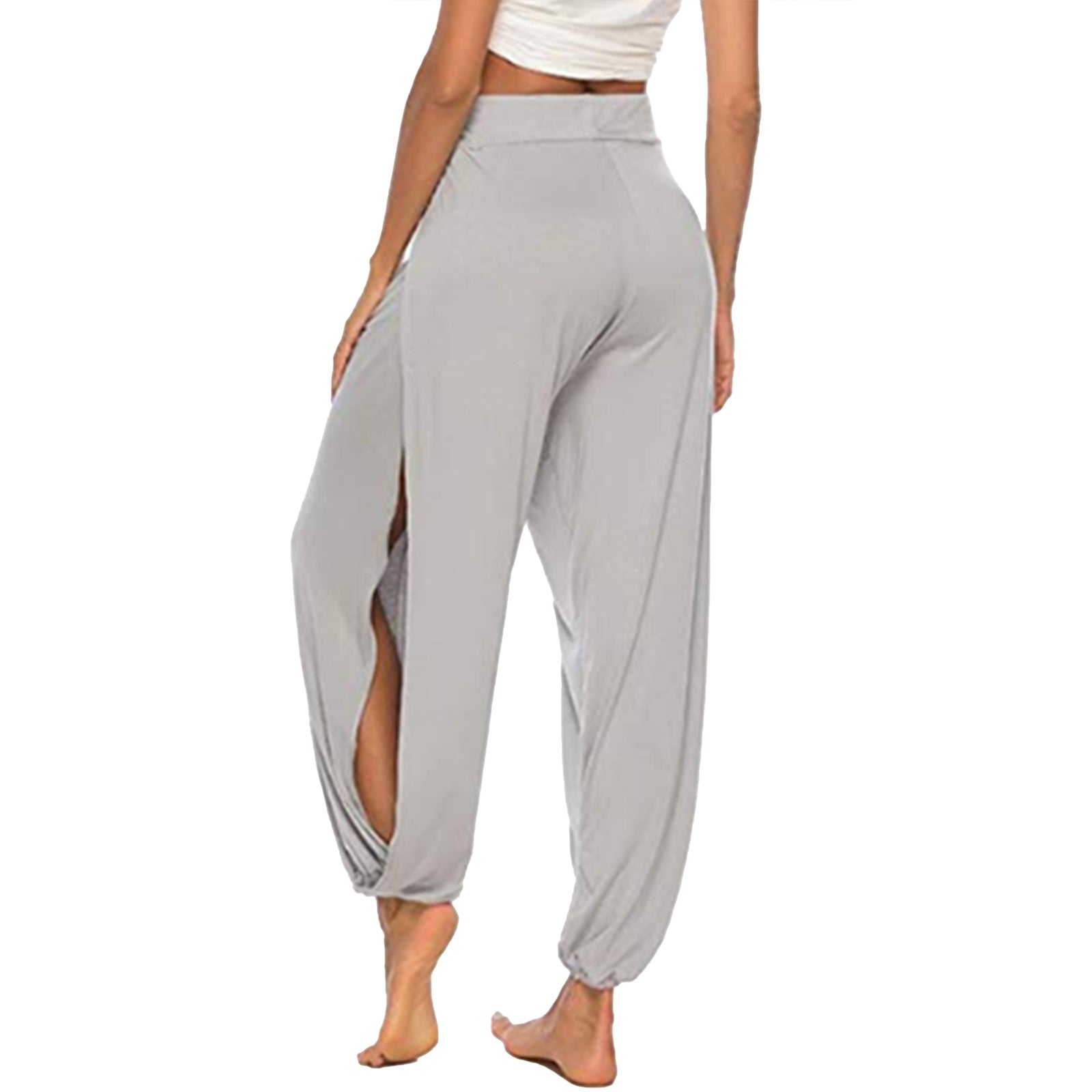 Gray wide-leg pants with a front slit worn by a person on a white background