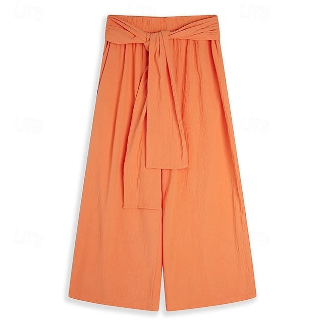 Orange wide-leg pants with a tie waist on a white background