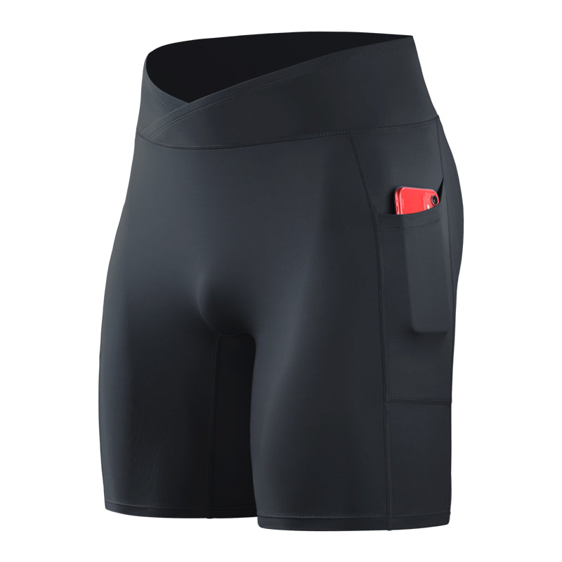 Black athletic shorts with a red phone in the pocket on a white background