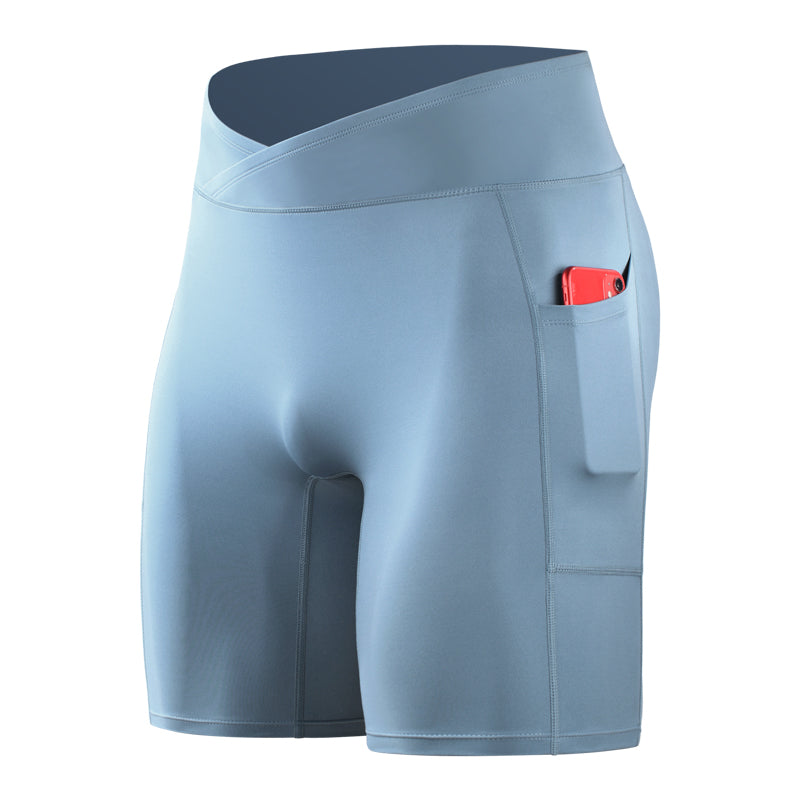 Light blue athletic shorts with a pocket on a white background