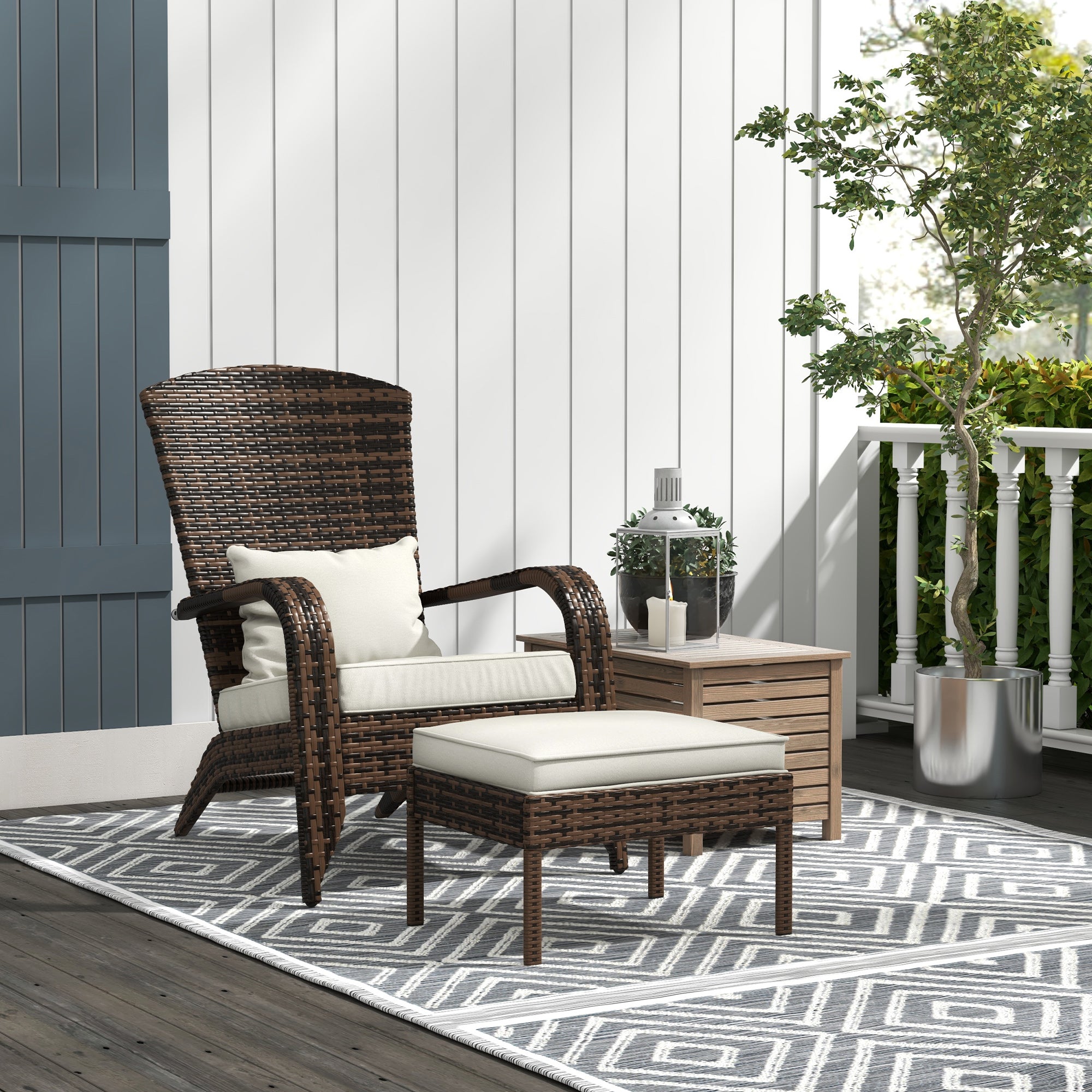 Outdoor patio set with wicker chair and ottoman on a patterned rug.