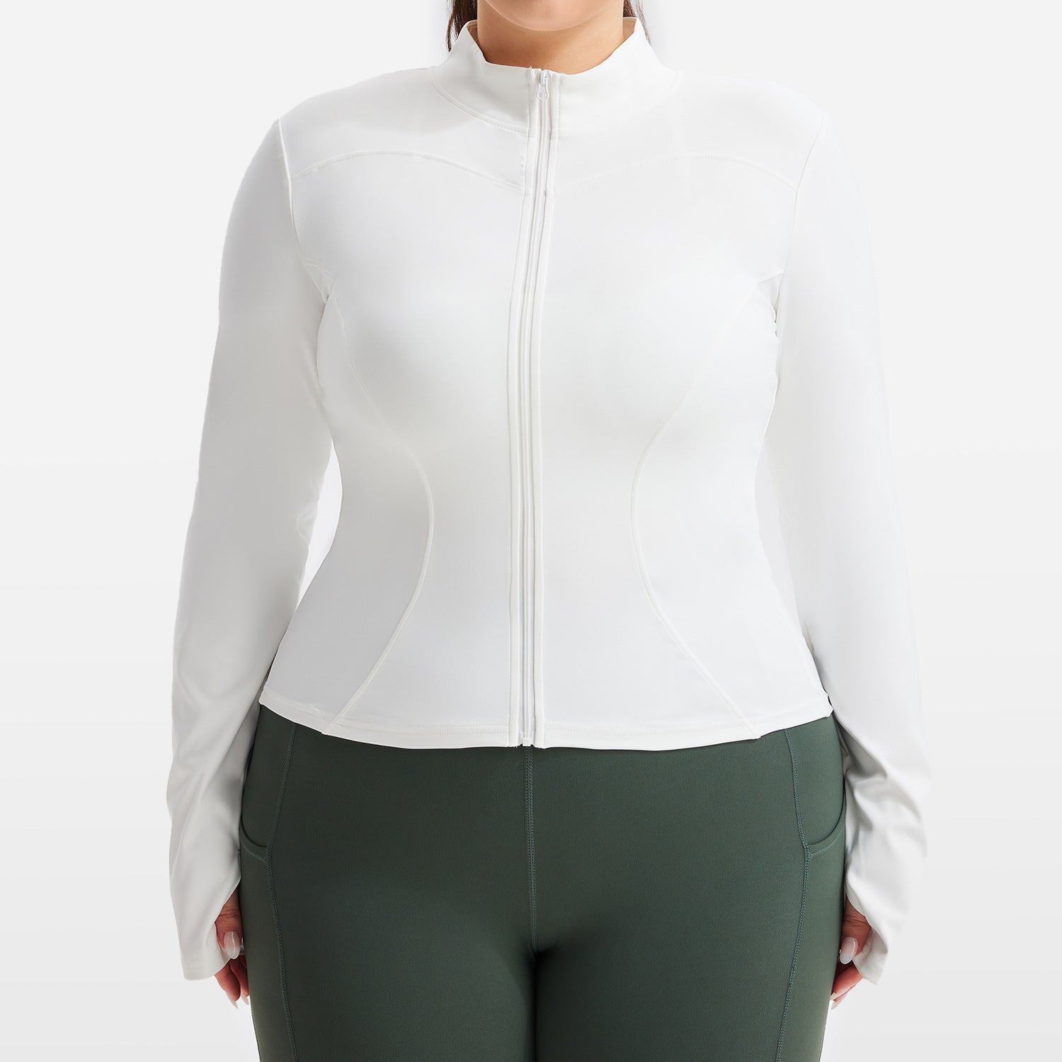 Person wearing a white zip-up jacket and green leggings on a white background