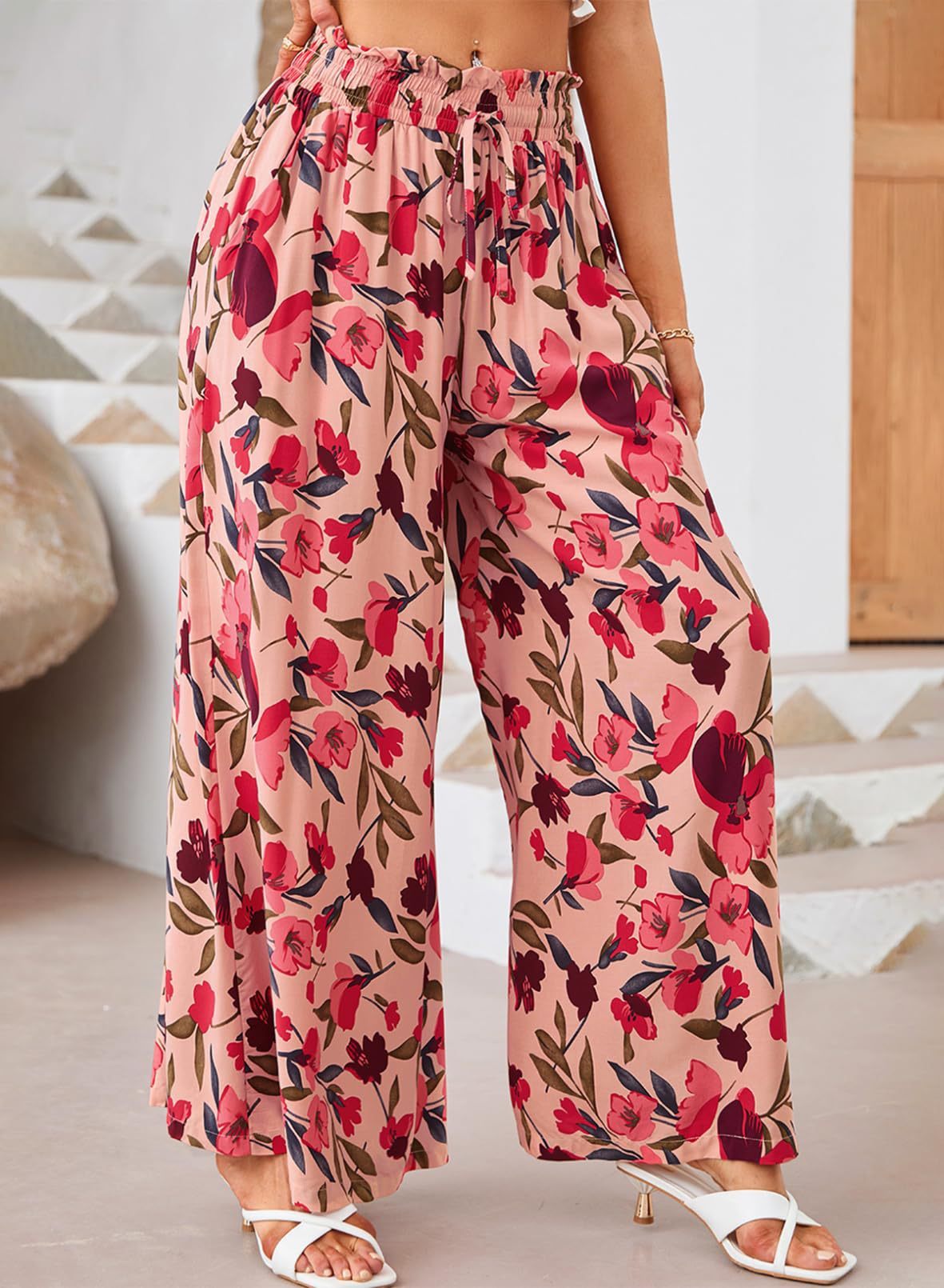 Floral patterned pants worn by a person indoors.
