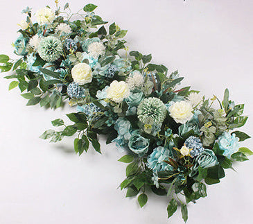 Artificial floral arrangement with green and blue tones on a white background, labeled 'Tiffany Blue'.