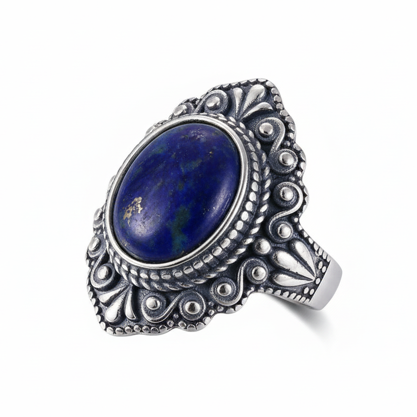Silver ring with a blue stone on a white background