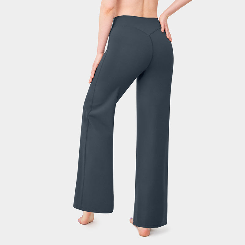 Dark gray wide-leg pants worn by a person on a light gray background