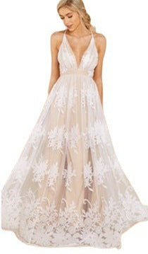 White lace dress with a deep V-neckline on a white background