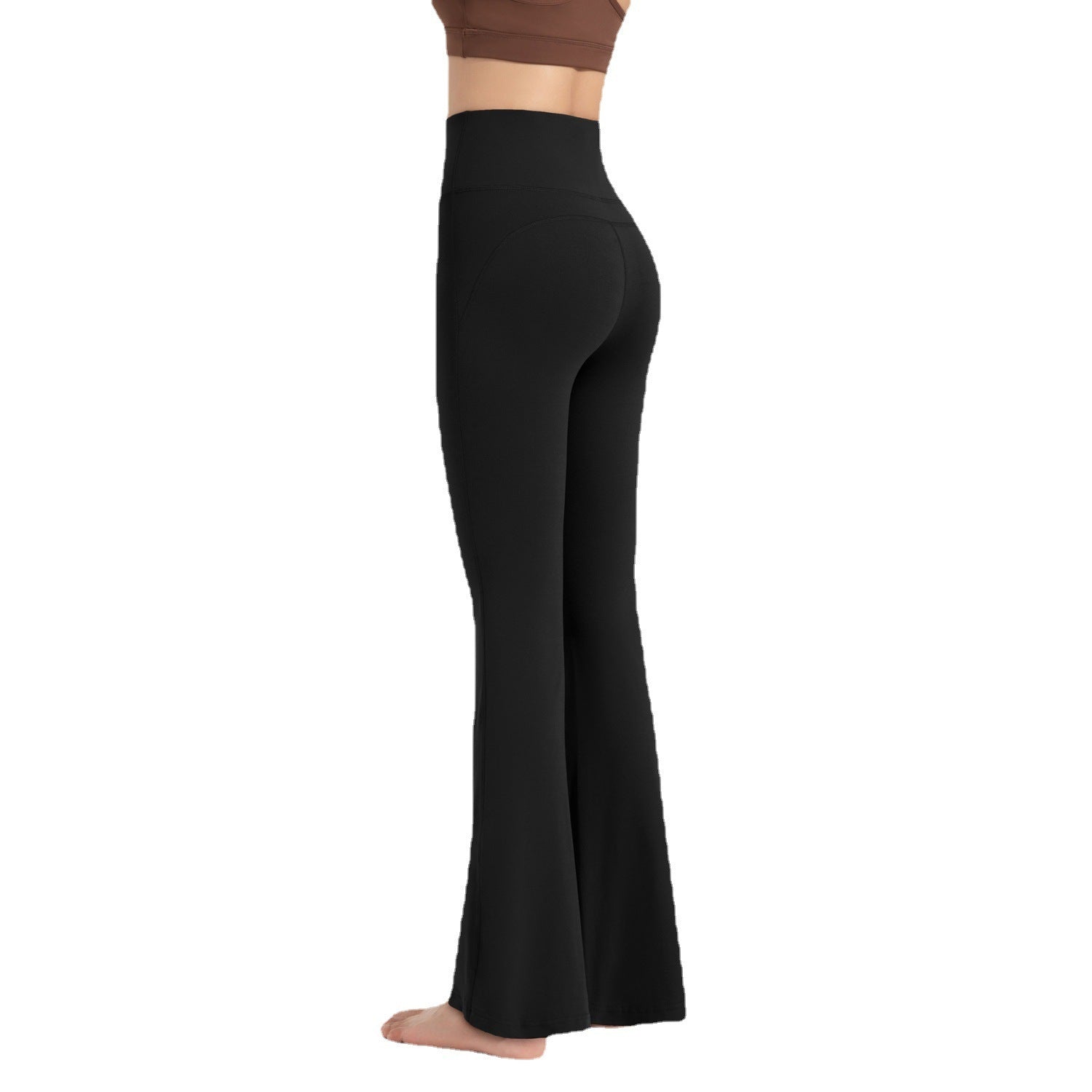 Black yoga pants worn by a person on a white background