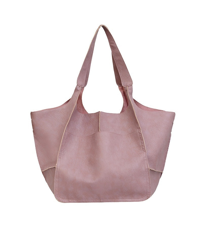 Pink tote bag on a white background