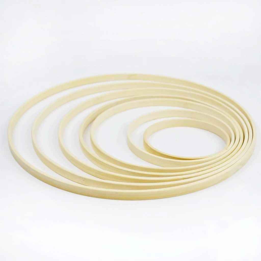 Set of circular wooden rings on a white background