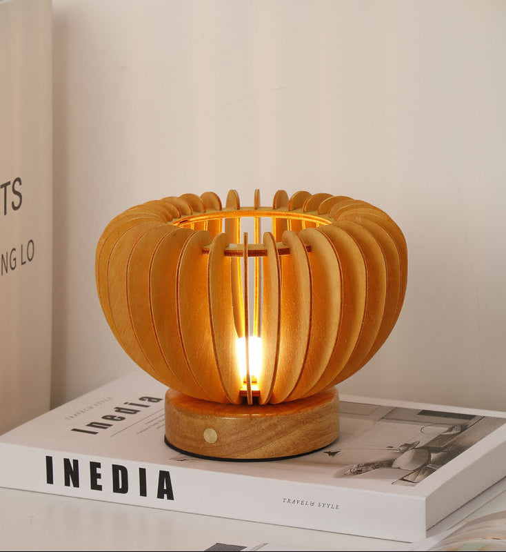 Wooden table lamp on a book with a minimal background