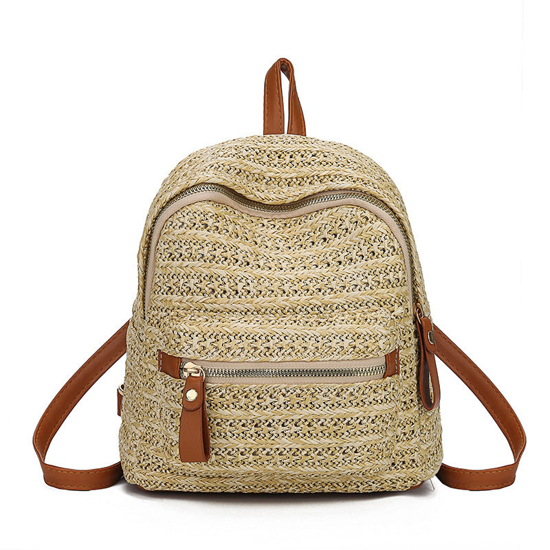 Beige woven backpack with brown accents on a white background