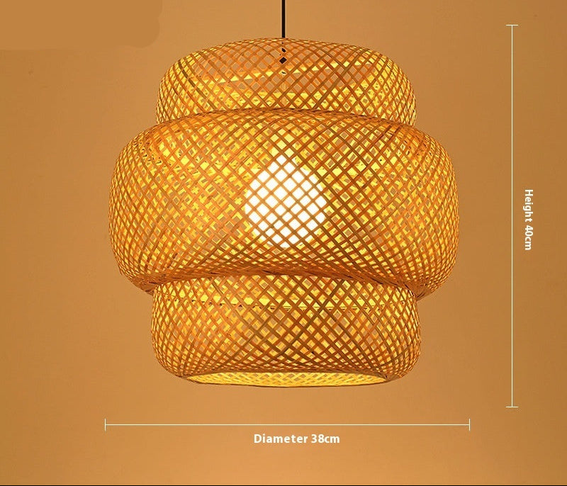 Woven bamboo pendant light with dimensions on a brown background