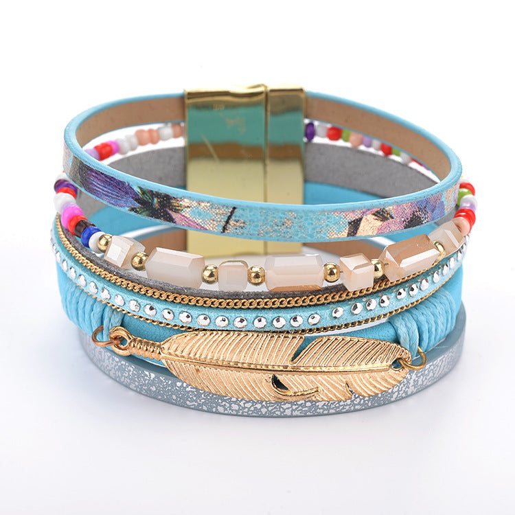 blue Boho Stack Bracelet with Golden Feather