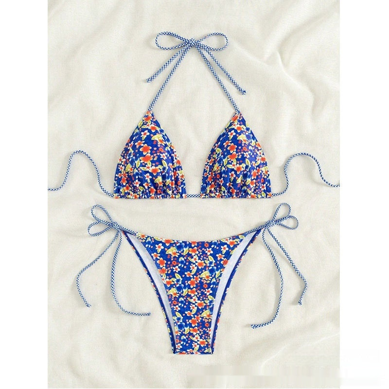 Blue floral bikini set on a white background