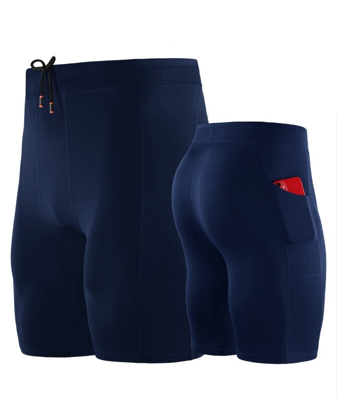 Navy blue athletic shorts with a red pocket on a white background