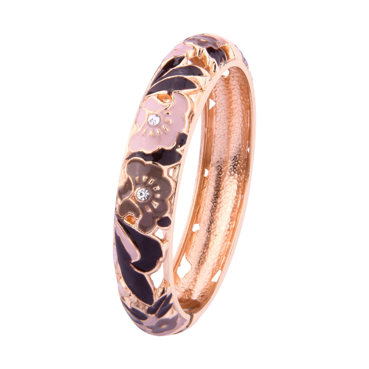 Rose gold bracelet with floral design and embedded stones on a white background