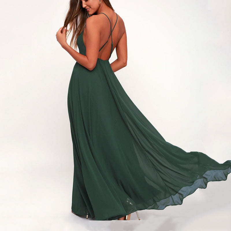 Green evening gown with open back on a white background