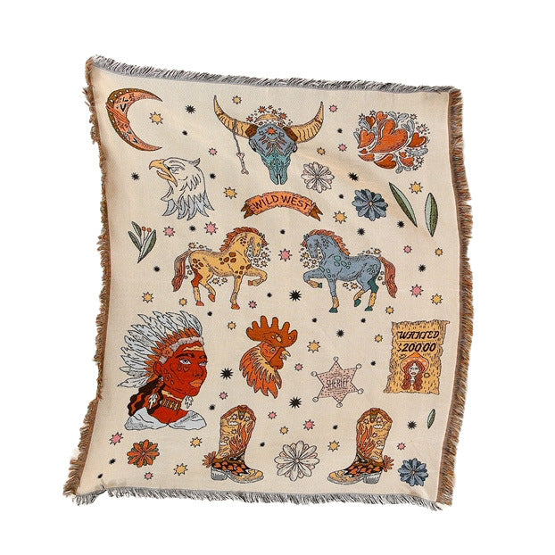 Beige blanket with Wild West-themed illustrations on a white background