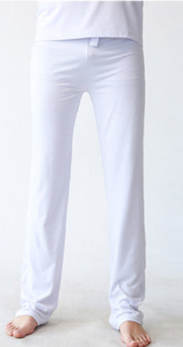 White pants worn by a person on a white background