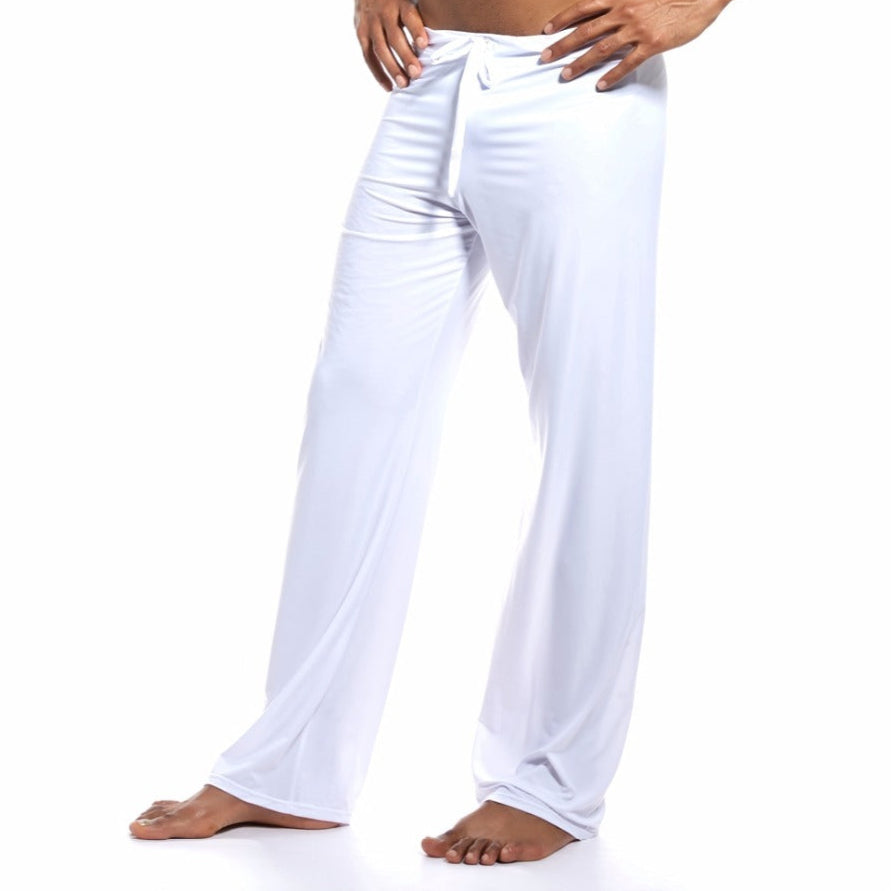 Person wearing white pants on a white background