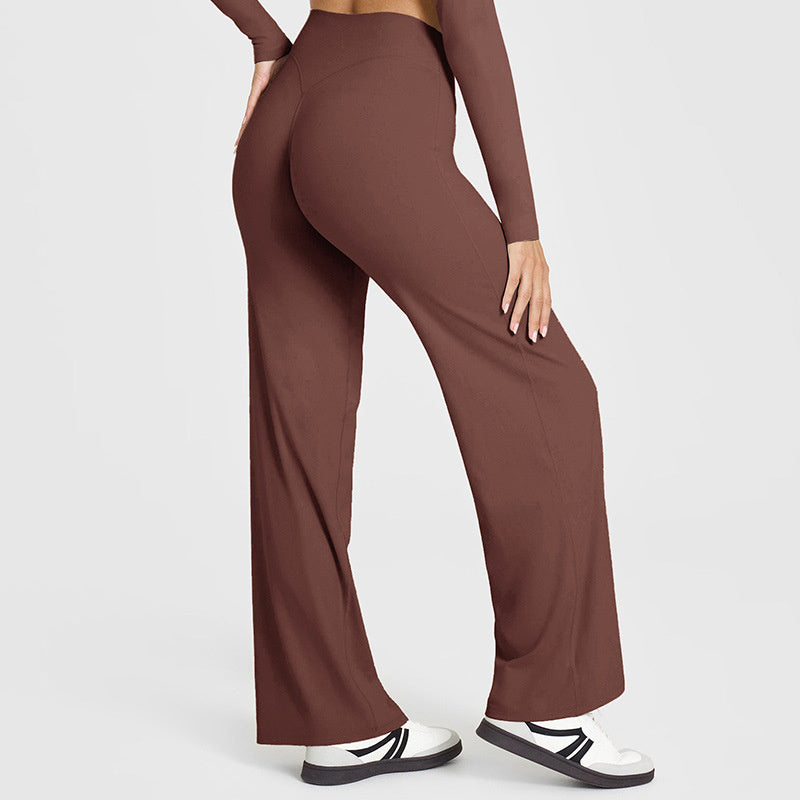Brown wide-leg pants worn by a person on a white background