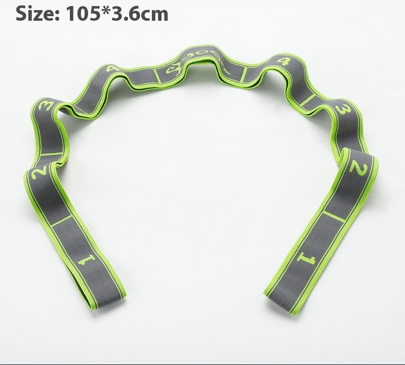 Green fitness shaping resistance band with numbers on a white background