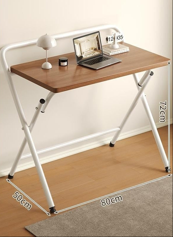 Wooden desk with white frame on a wooden floor, featuring product details and usage suggestions.