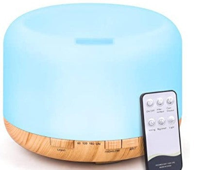 White diffuser with remote control on a white background